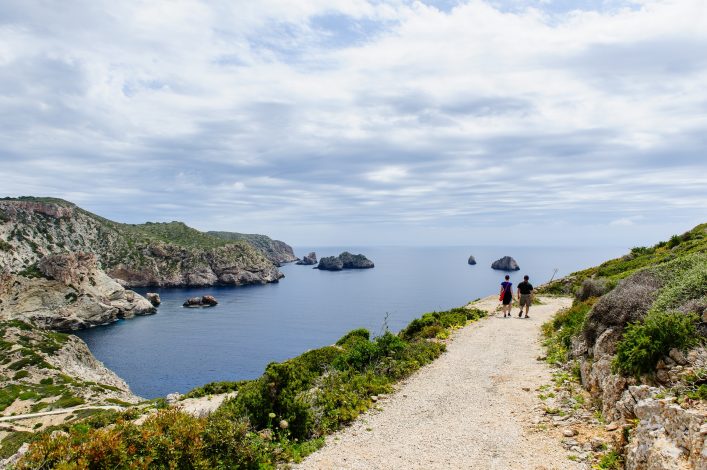 Treveller’s couple walking. Mediterranean islands.