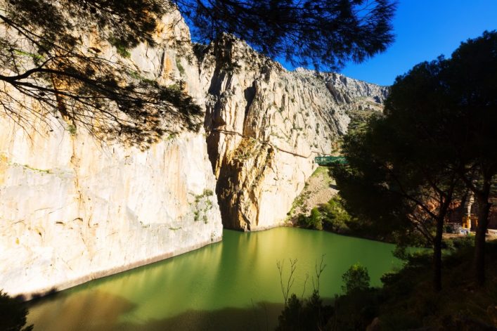 General-view-of-Caminito-del-Rey-with-Railway-bridge-over-Reservoir-at-Chorro-river_shutterstock_267517379