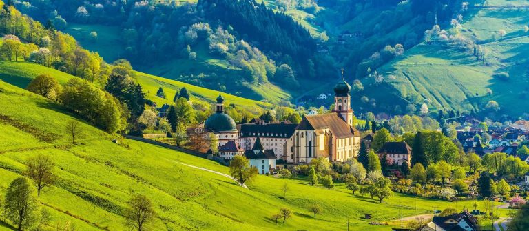 beautiful-countryside-mountain-landscape-with-a-monastery-in-village-shutterstock_286284614-2